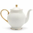 Witte porseleinen theepot met goudkleurige details uit de Aurelia Diamante collectie.