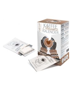 Café Cult Kaffee Adventskalender met geopende onderzijde en zichtbare drip coffee bags ernaast op witte achtergrond.