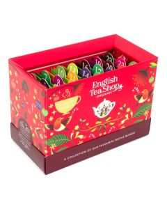 Schuin bovenaanzicht van de rode English Tea Shop adventskalender met 25 kleurrijke genummerde vakjes en kerstdesign.