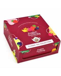 Bordeauxrode English Tea Shop Classic Tea Collection geschenkdoos met kleurrijke illustraties van aardbeien, frambozen, blauwe bessen en citrusvruchten, liggend gefotografeerd op een witte achtergrond.