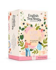 Crèmekleurige English Tea Shop Organic For You geschenkdoos met roze accenten, kleurrijke bloemenillustraties en 20 biologische theezakjes in verschillende smaken.