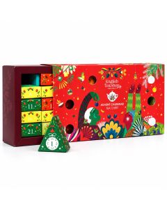 Geopende rode English Tea Shop Advent Calendar Tea Chest met kleurrijke genummerde theedoosjes en een piramidevormig vakje.