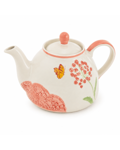 Keramische theepot Rosalie van 1000 ml in gebroken wit met roze bloemen, vlinderdetail en roze accent op de handgreep tegen een lichte achtergrond.