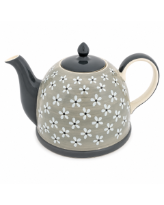 Crèmekleurige keramische theepot van 1900 ml met donkergrijze tuit, deksel en accenten, versierd met kleine witte bloemetjes op een witte achtergrond.