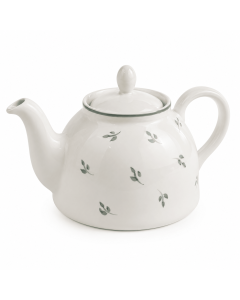 Keramische theepot Leafy van 1200 ml in wit met subtiel groen bladdessin en fijne groene rand tegen een lichte achtergrond.