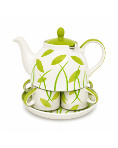 Zesdelig keramisch theeservies met witte theepot, groene details, bladmotief, twee kopjes en bijpassende schaal.
